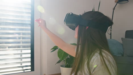 Girl-in-VR-goggles,-watching-and-touching-objects-in-virtual-reality